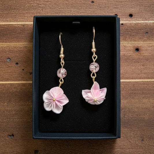 Butter Moon Creations, LLC pink floral dangle earrings with gold-tone findings and marbled beads.