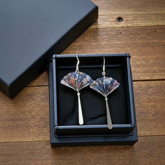 Butter Moon Creations LLCHandcrafted paper fan earrings with blue, pink, orange floral pattern and silver dangles.