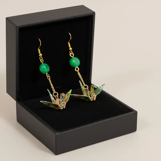 Butter Moon Creations LLc green floral washi paper origami crane earrings with malachite-style beads and gold-tone chain.