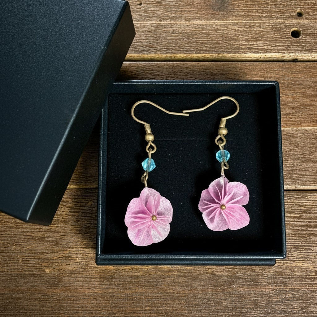 Butter Moon Creations LLc pink fabric floral dangle earrings with blue bead accents.