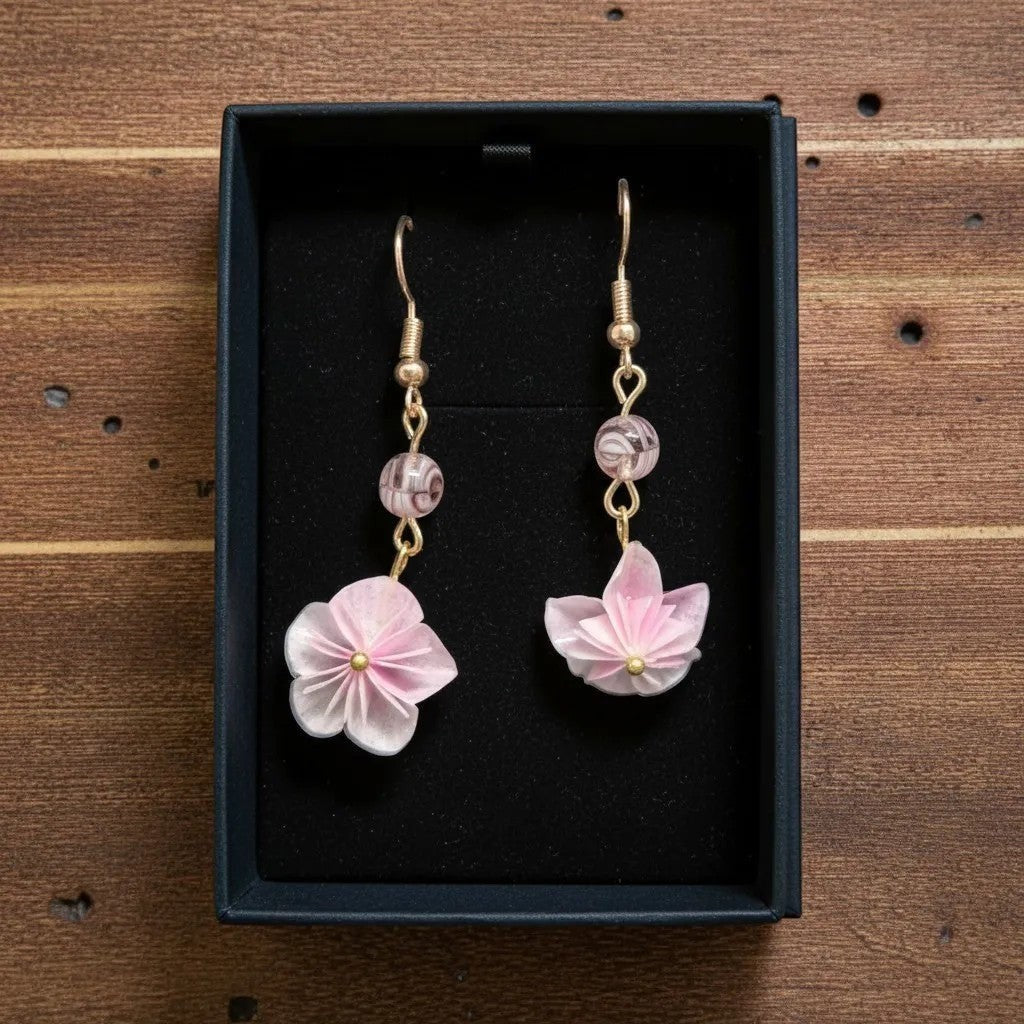 Butter Moon Creations, LLC pink floral dangle earrings with gold-tone findings and marbled beads.