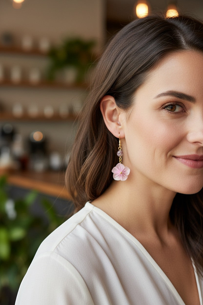 Butter Moon Creations, LLC pink floral dangle earrings with gold-tone findings and purple beads.