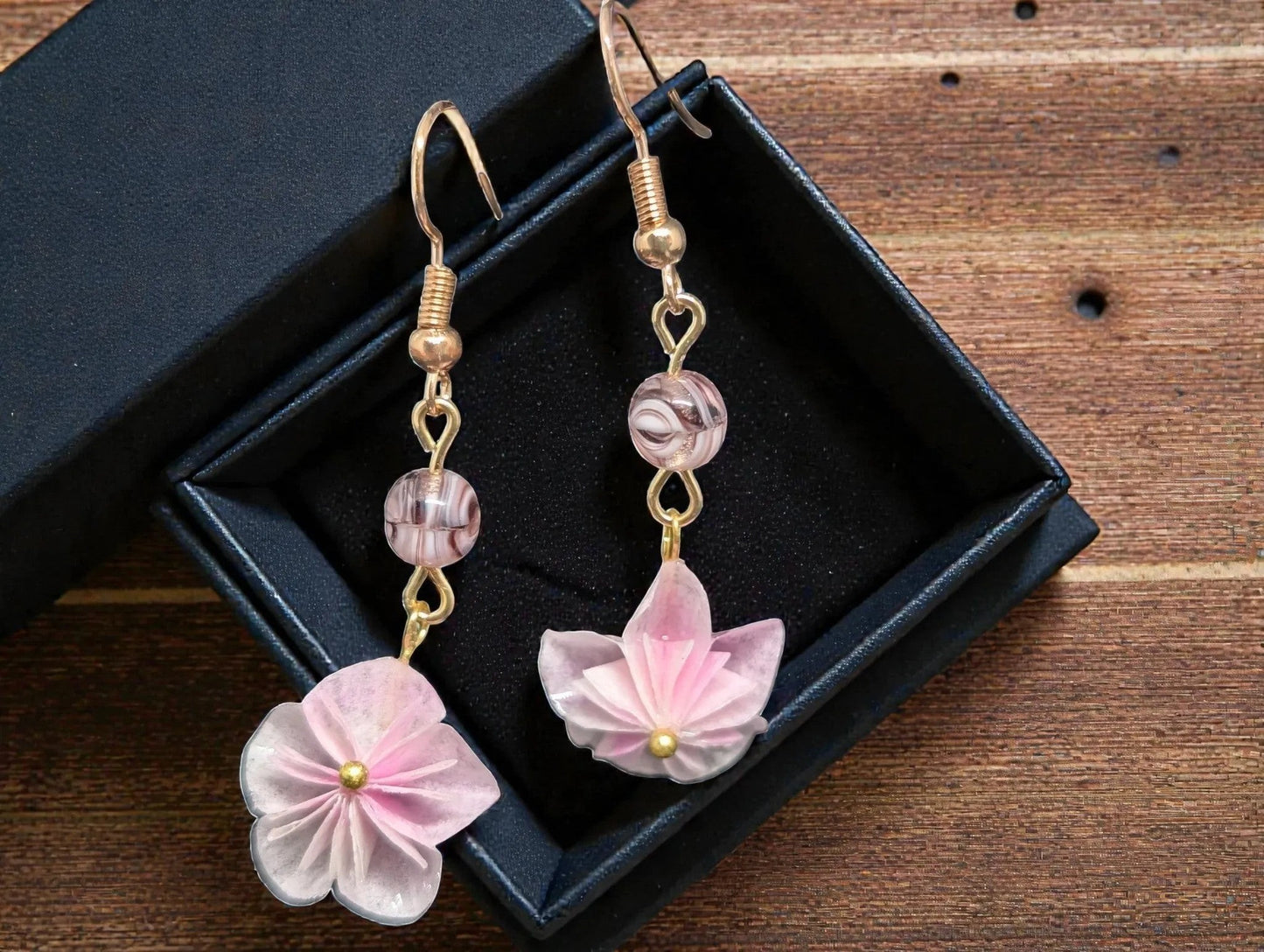 Butter Moon Creations, LLC pink floral dangle earrings with gold-tone findings and marbled beads.