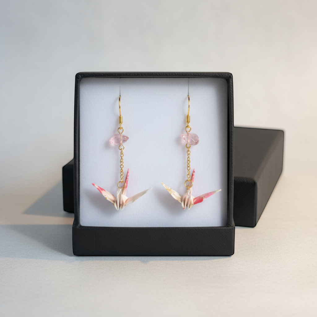 Butter Moon Creations, LLCHandmade pink floral washi paper origami crane earrings with rose quartz beads and gold accents.